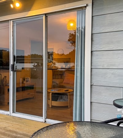 Bright and inviting space with large sliding doors, perfect for enjoying indoor-outdoor living.