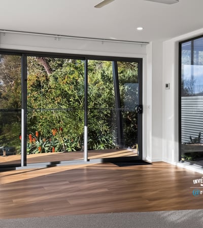 Bright and airy living space with large windows that offer stunning views of the outdoors.