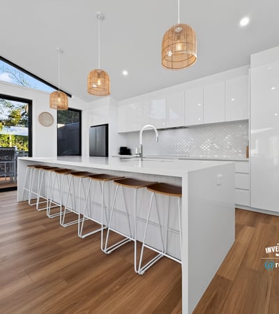 Modern kitchen featuring spacious design, sleek cabinetry, and ample natural light, perfect for entertaining.