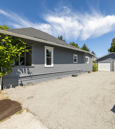 Discover this inviting home featuring ample outdoor space and convenient off-street parking in a quiet neighborhood.