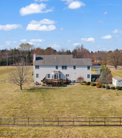 Amenities of this well-designed home include a home warranty, 2-zone heating and cooling, natural gas, and central vacuum.