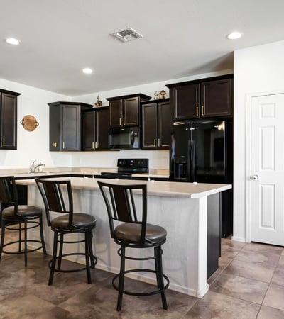 Breakfast bar seating area that adds casual dining space and enhances the kitchen s open-concept design.