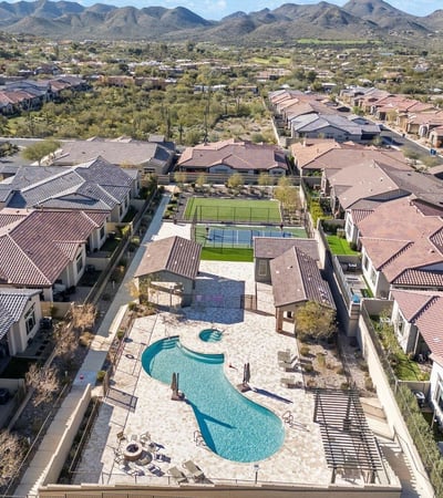 Resort-inspired community pool and spa area designed for relaxation, socializing, and enjoying sunny Cave Creek days.