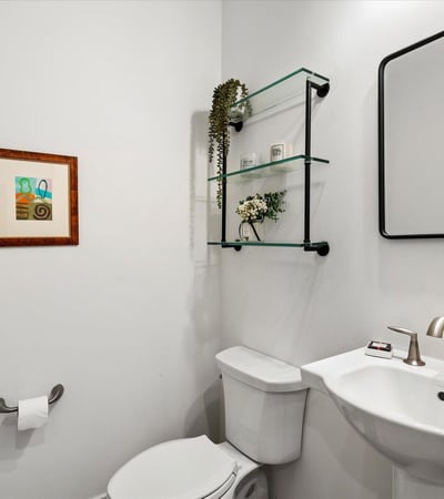 Contemporary powder room featuring clean lines, modern fixtures, and tasteful finishes. Perfectly appointed for guests in this Scottsdale home.