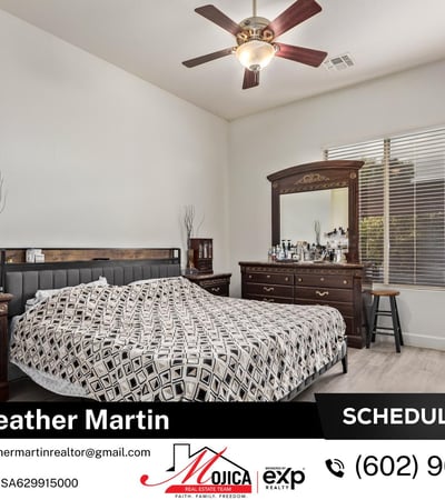 This spacious owner s suite showcases updated flooring, ceiling fan, and abundant natural light. Designed for relaxation, it enhances the comfort and value of this Glendale home with pool and 3-car garage.