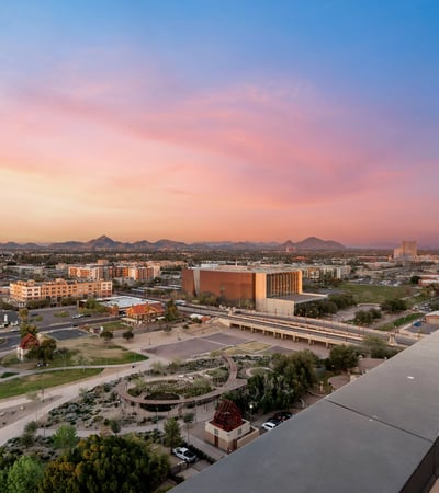 Spacious rooftop deck with unobstructed views of the city and mountains, enhancing the appeal of this Phoenix residence.