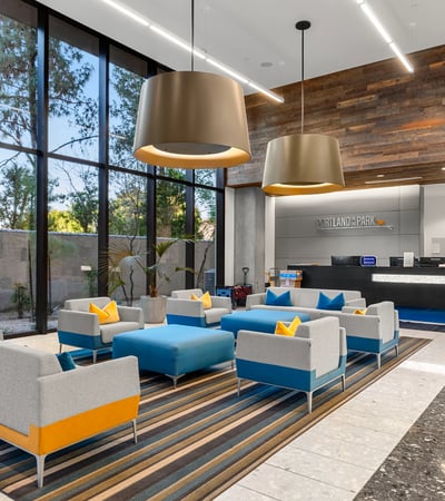 Stylish reception space with sleek desk, modern lighting, and updated interior design, offering a polished welcome in Phoenix.