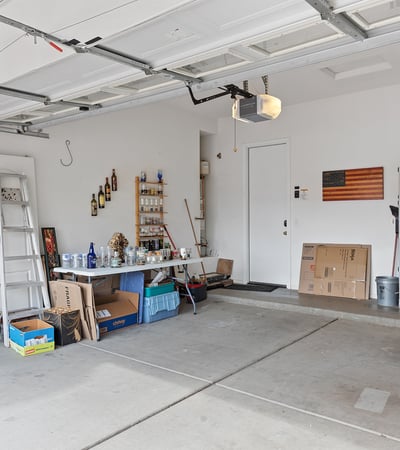 Spacious garage offering room for vehicles, tools, and storage, providing versatility and practicality in this Phoenix property.