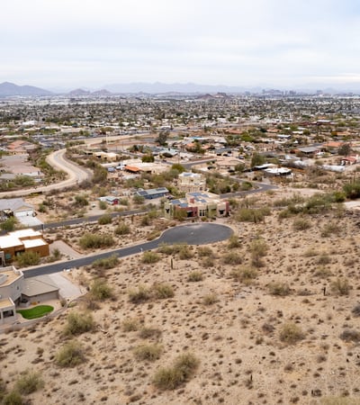 Unforgettable panoramic views overlook the Phoenix valley from this rare hillside lot near South Mountain Preserve. Experience vibrant sunsets, sparkling city lights, and endless desert beauty from every angle.