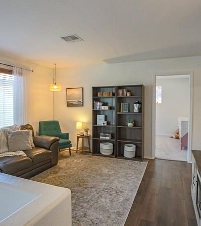 Inviting upstairs loft offering comfortable living space, abundant natural light, and flexible functionality for today's changing lifestyle needs.