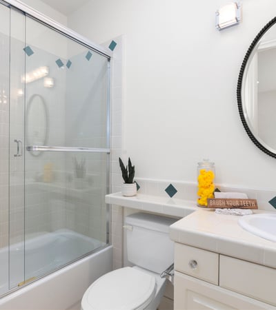 Bedroom 5's private en-suite bathroom featuring modern fixtures and a practical layout for everyday convenience.