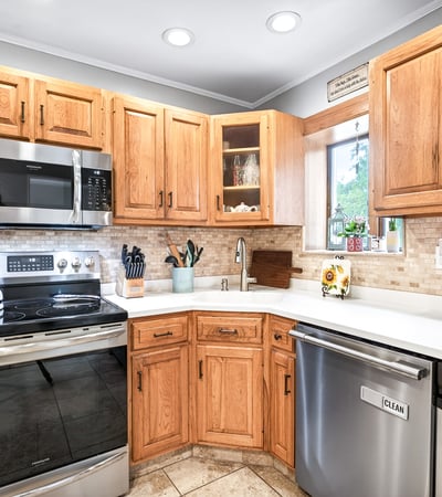 Efficient kitchen with SS appliances.
