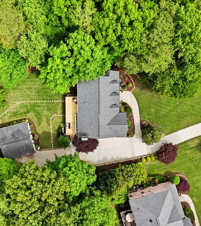 Nestled in lush greenery, this property features spacious outdoor areas and a thoughtfully designed layout.