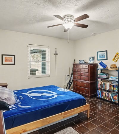 Another view of the first bedroom from the door located off of the hallway across from the bathroom.