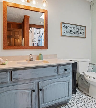 Guest bathroom which has a newer skylight to allow for optimal natural light!