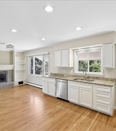 Bright and spacious kitchen seamlessly flows into the inviting living area, perfect for everyday living.