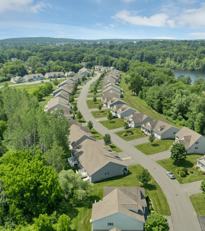 Discover a peaceful neighborhood with spacious homes, surrounded by lush greenery and scenic views.
