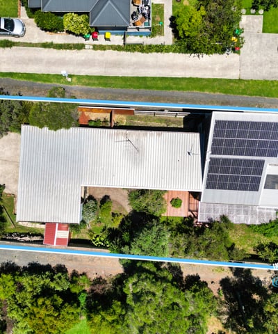 Spacious property featuring solar panels and ample outdoor space, nestled in a vibrant neighborhood.