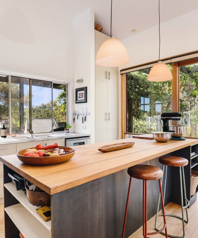 Bright and spacious kitchen featuring modern appliances and seamless indoor-outdoor flow, ideal for entertaining.