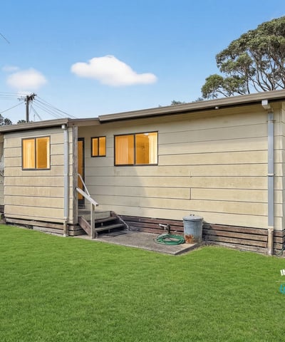 This spacious home features a generous yard, ideal for outdoor activities and gatherings.