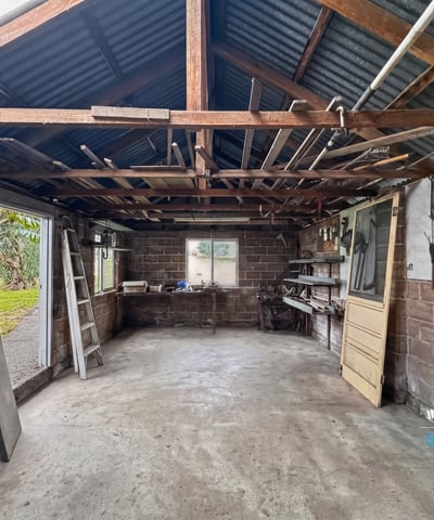 Spacious workshop with open layout, ample natural light, and potential for customization to suit your needs.