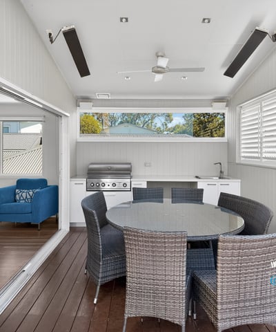 Bright and spacious outdoor entertaining area featuring modern amenities and a seamless indoor-outdoor flow.
