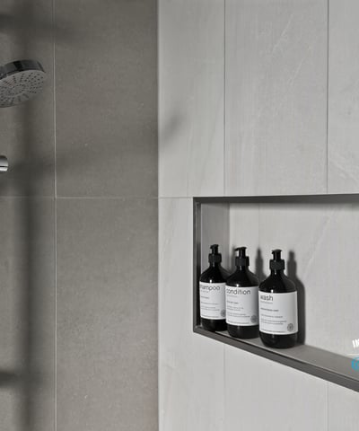 Modern shower featuring a sleek design and built-in niche for organized storage of essentials.