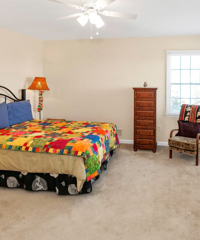 Roomy Bedroom 3 has a fan/light, double windows, and a large closet.