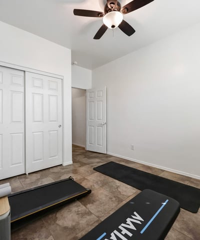 Bedroom closet featuring built-in shelving and hanging rods, maximizing storage and organization.