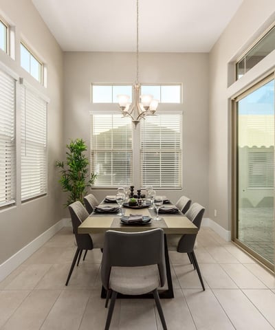 Dining space with direct patio access, offering seamless indoor-outdoor flow ideal for entertaining and enjoying the Cave Creek lifestyle.