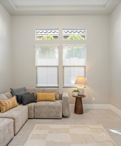Adaptable flex room with tile floors and neutral tones, easily suited for a home office, workout room, or creative studio.