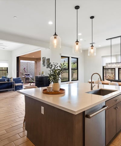 Light-filled great room with expansive proportions, modern finishes, and seamless flow to adjacent living spaces. Designed for Scottsdale buyers who value openness and style.