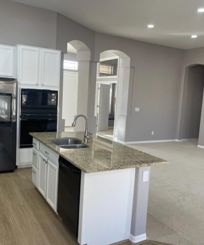 Functional kitchen island with sink and ample prep space, perfect for cooking, hosting, and casual dining.