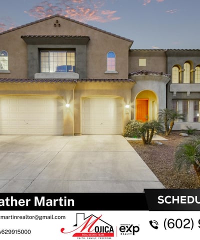 Exterior lighting highlights the architectural charm of this Glendale home at twilight. The three-car garage, extended driveway, and clean desert landscaping create a stunning first impression.