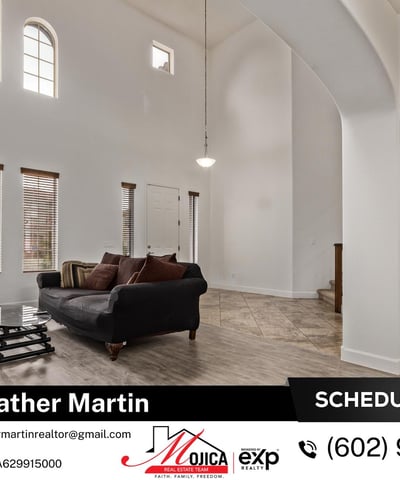 Vaulted ceilings and tall windows create a bright, welcoming great room. Updated flooring and an open floor plan enhance the spacious feel of this Glendale home designed for comfort and energy efficiency.