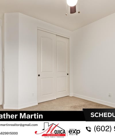 Double doors and neutral tones give this bedroom versatile appeal. A comfortable space in this Glendale property with energy-efficient systems and updated kitchen finishes.