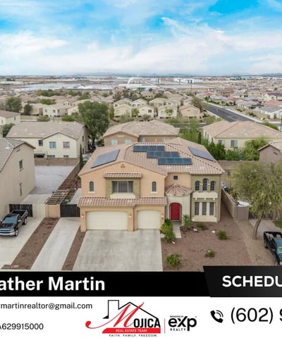 Drone perspective highlights the tile roof, 3-car garage, and solar energy system. This Glendale home offers impressive exterior design and energy-efficient features.