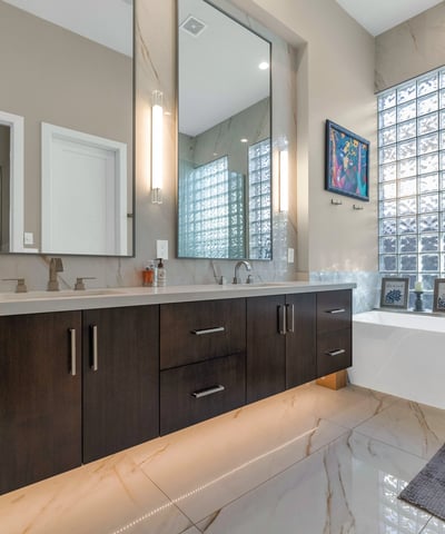 Luxurious bathroom featuring a soaking tub, dual sinks, and modern finishes, creating a relaxing spa-like atmosphere in Phoenix.