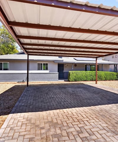 Extended driveway with direct unit access supports tenant convenience and enhances the usability of this Phoenix rental property.