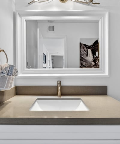 Clean Scottsdale bathroom featuring updated vanity, sleek fixtures, and solid surface counters for a modern, low-maintenance space.