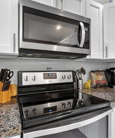 Stylish Scottsdale kitchen showcasing granite counters, stainless appliances, modern cabinetry, and efficient layout ideal for everyday living.