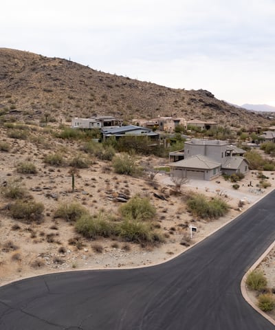Elevated homesite featuring dramatic mountain backdrops and scenic desert surroundings. Enjoy peaceful hillside living with direct access to nearby hiking trails and outdoor recreation in Phoenix.