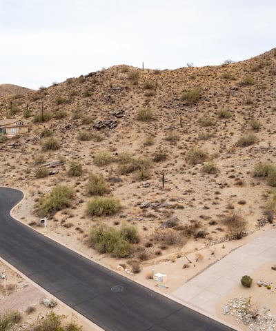 Peaceful cul-de-sac setting surrounded by rugged desert mountains and upscale custom homes. This premium Phoenix homesite offers elevated terrain, scenic views, and a tranquil desert lifestyle.