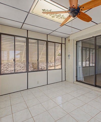 This enclosed Arizona room provides additional living space with abundant natural light and easy indoor-outdoor flow. The flexible layout is ideal for recreation, hobbies, entertaining, or casual relaxation.