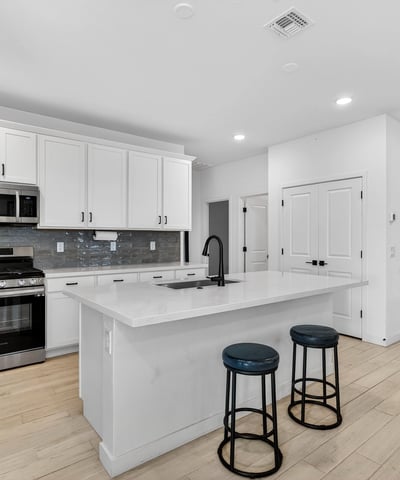 From the moment you enter, you'll appreciate the open floor plan connecting the spacious kitchen, dining area, and great room with stylish finishes, natural light, and modern design throughout.