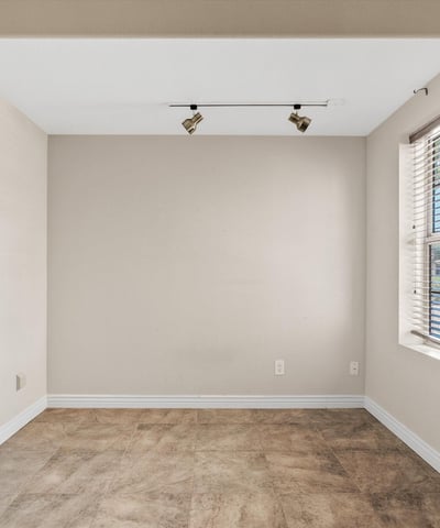 This versatile flex room offers natural light, durable tile flooring, and endless possibilities as an office, hobby room, playroom, or additional bedroom to fit your lifestyle.