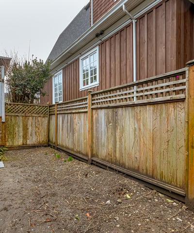 This spacious outdoor area features a private setting, perfect for gardening or outdoor activities.