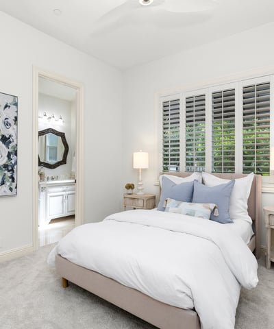 Downstairs Bedroom 1
Bright and inviting bedroom featuring soft decor, modern finishes, and natural light filtering through plantation shutters.