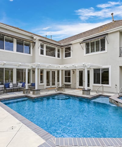 Expansive home with a stunning salt water pool, with newer pool heater and featuring tons of room to entertain