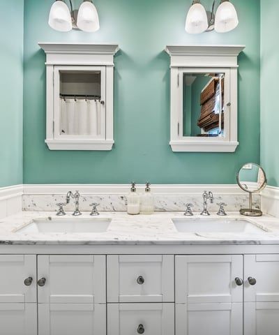 Dual sinks and medicine cabinets.